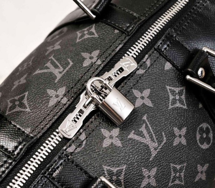 Louis Vuitton Taiga Leather Keepall Bandouliere 50 Travel Bag In Black