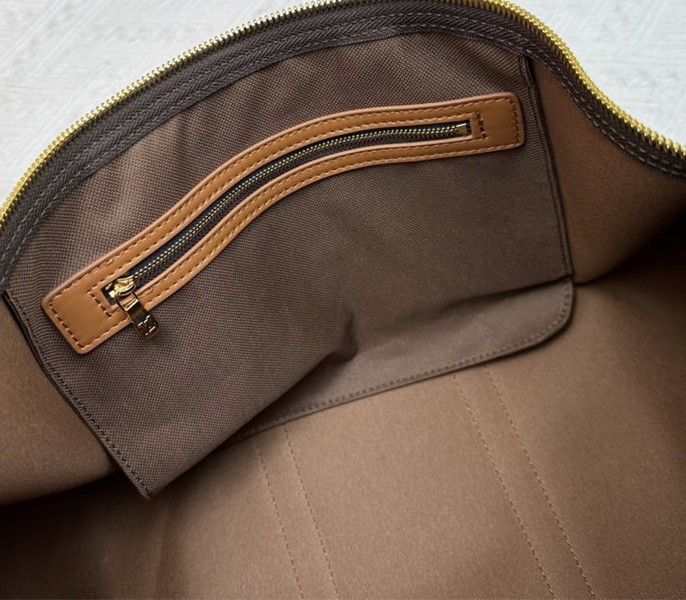 Louis Vuitton Monogram Dust Canvas Keepall Bandouliere 50 In Brown