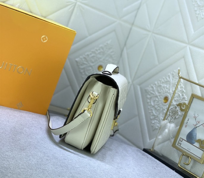 Monogram Empreinte Leather Metis In Cream M46552