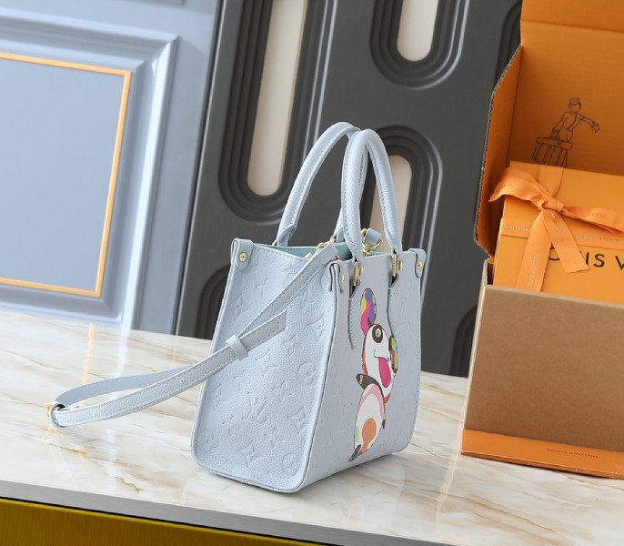 X TM Monogram Empreinte OnTheGo PM With Bijou Edition In Washed Blue