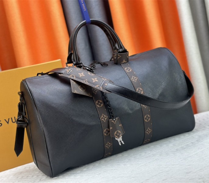 Louis Vuitton Taiga Leather Keepall Bandouliere 45 In Black And Monogram Macassar Canvas