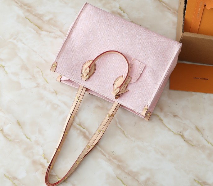 Monogram Denim OnTheGo MM In Washed Pink