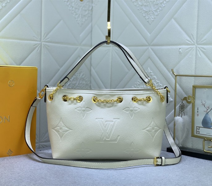 Louis Vuitton Monogram Empreinte Leather Bundle Bag In Cream