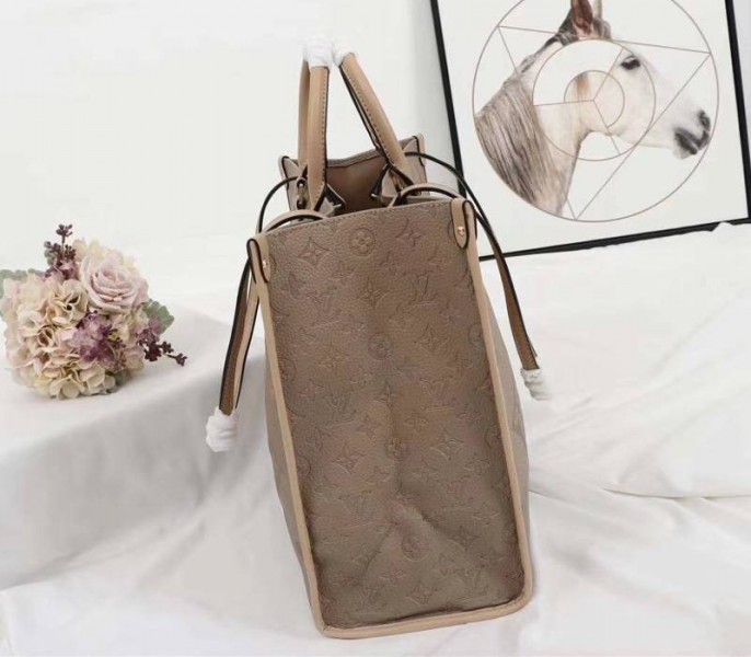 Louis Vuitton Monogram Empreinte Giant Onthego GM Tote In Beige