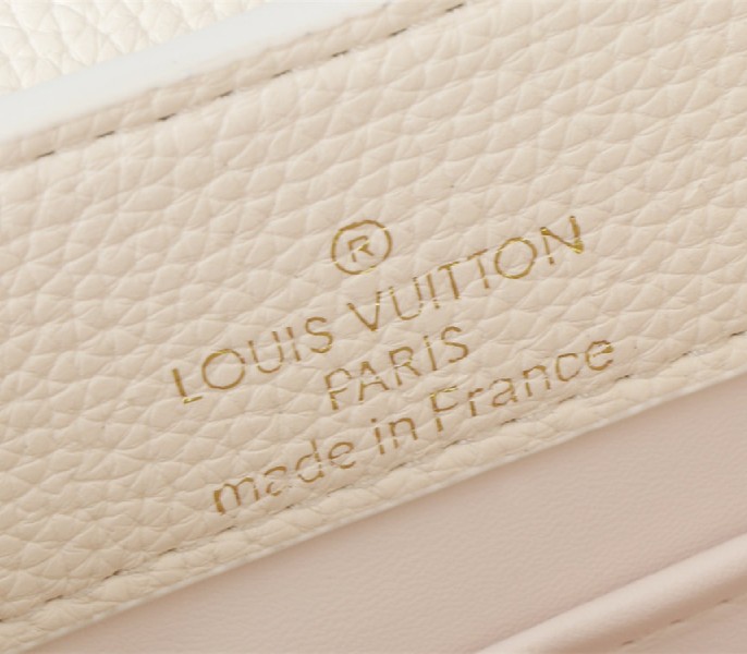 Louis Vuitton Capucines Mini Capucines Handbag In Quartz White