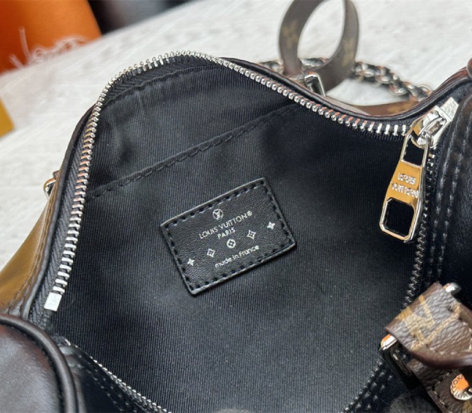 Louis Vuitton Vibe Keepall Bandouliere 25 In Black And Monogram Canvas