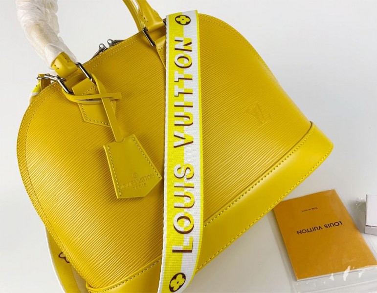 Louis Vuitton Epi Leather Alma PM Handbag In Cedrat Yellow With Jacquard Strap
