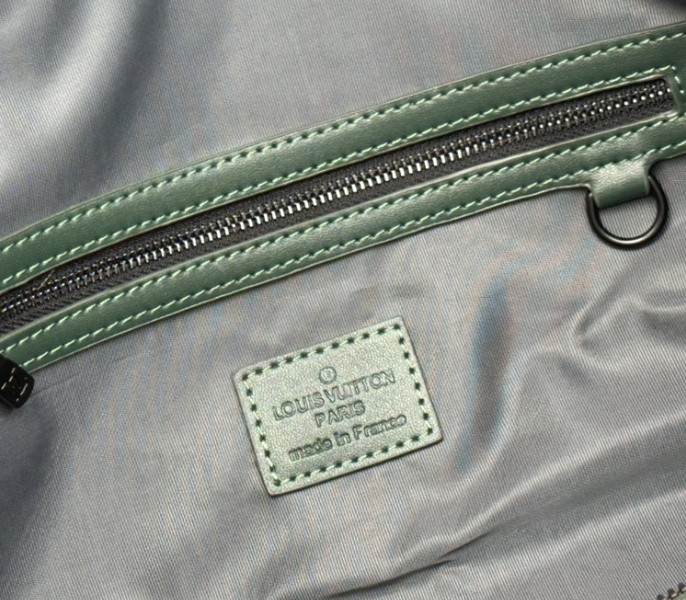 Louis Vuitton Taurillon Leather Keepall Bandouliere 50 In Borneo Green