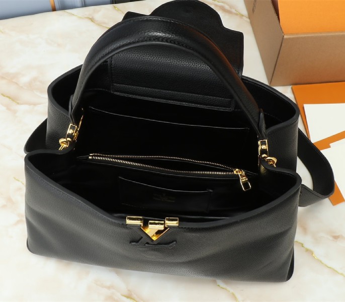 Louis Vuitton Capucines GM Souple Handbag In Black