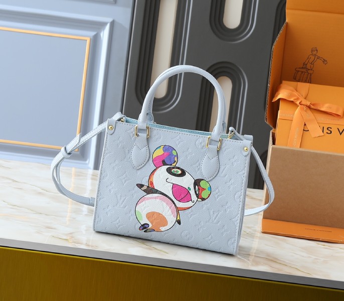 X TM Monogram Empreinte OnTheGo PM With Bijou Edition In Washed Blue