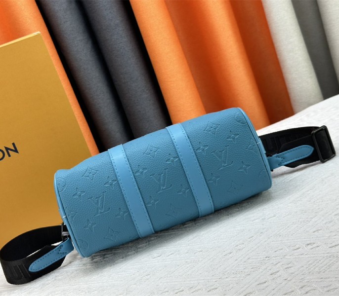 Louis Vuitton Taurillon Monogram Leather Keepall Bandouliere 25 In Turquoise