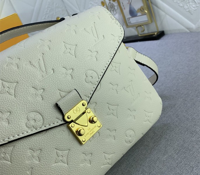 Monogram Empreinte Leather Metis In Cream M46552