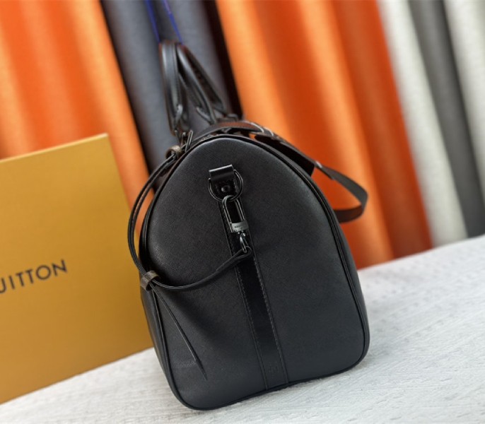 Louis Vuitton Taiga Leather Keepall Bandouliere 45 In Black And Monogram Macassar Canvas