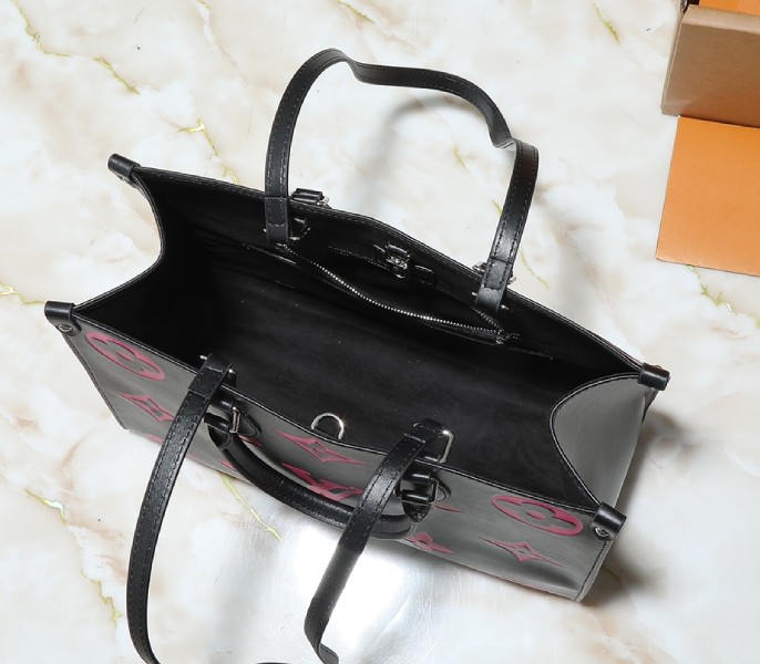 Monogram Empreinte OnTheGo MM Tote In Black And Magenta Pink