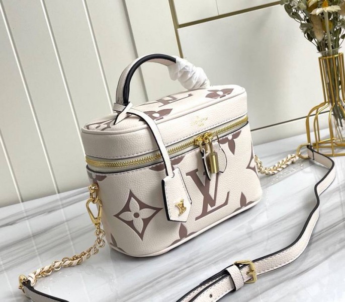 Louis Vuitton Bicolor Monogram Empreinte Vanity PM Bag In Cream And Bois De Rose Pink