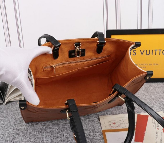 Louis Vuitton Monogram Empreinte Wild At Heart Onthego MM Tote In Caramel Brown