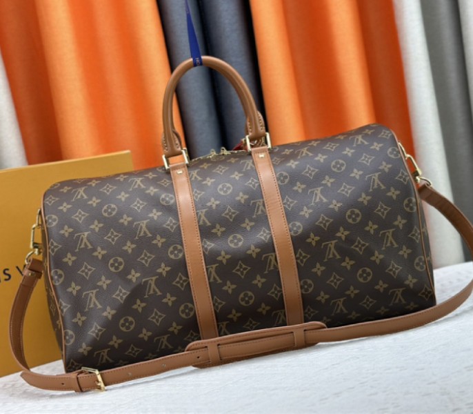 Louis Vuitton Monogram Dust Canvas Keepall Bandouliere 50 In Brown