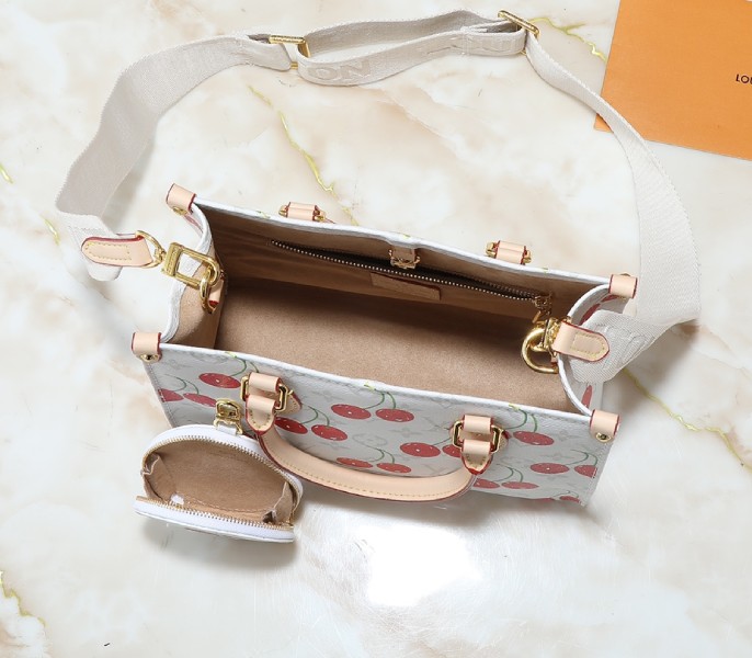 X TM Monogram Cherry Canvas Onthego PM In White