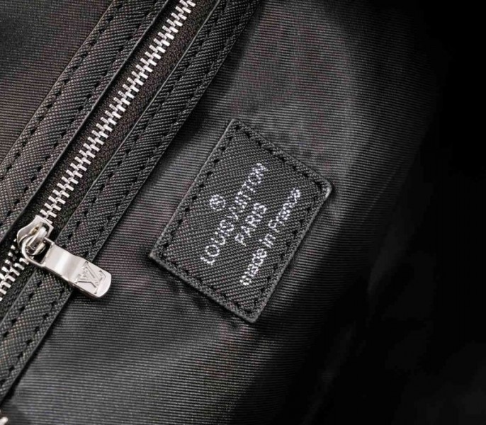 Louis Vuitton Taiga Leather Keepall Bandouliere 50 Travel Bag In Black