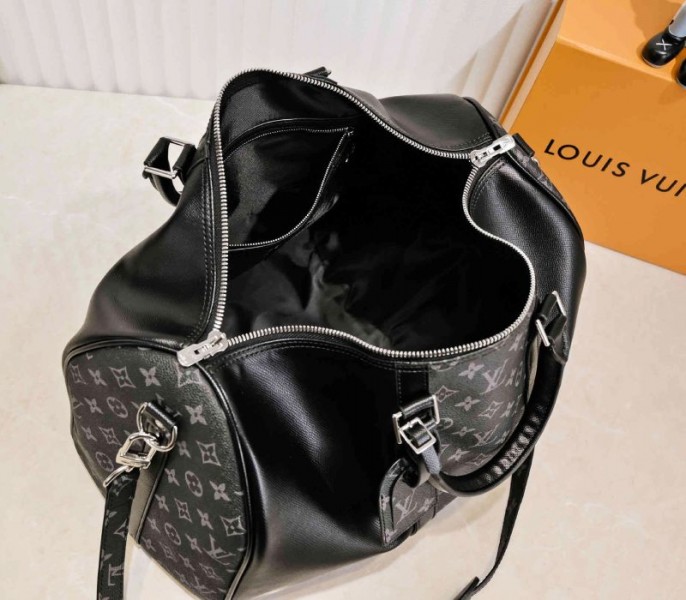 Louis Vuitton Taiga Leather Keepall Bandouliere 50 Travel Bag In Black