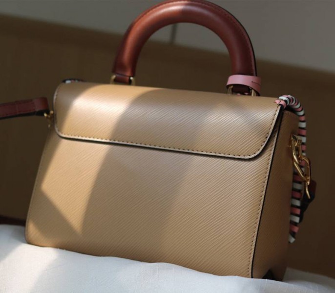 Louis Vuitton Epi Leather Twist MM Bag In Beige With Braided Edges Flap