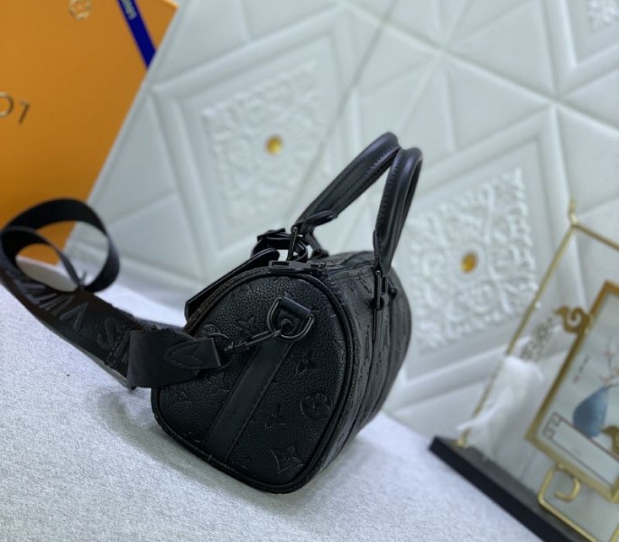 Louis Vuitton Taurillon Monogram Leather Keepall Bandouliere 25 In Black