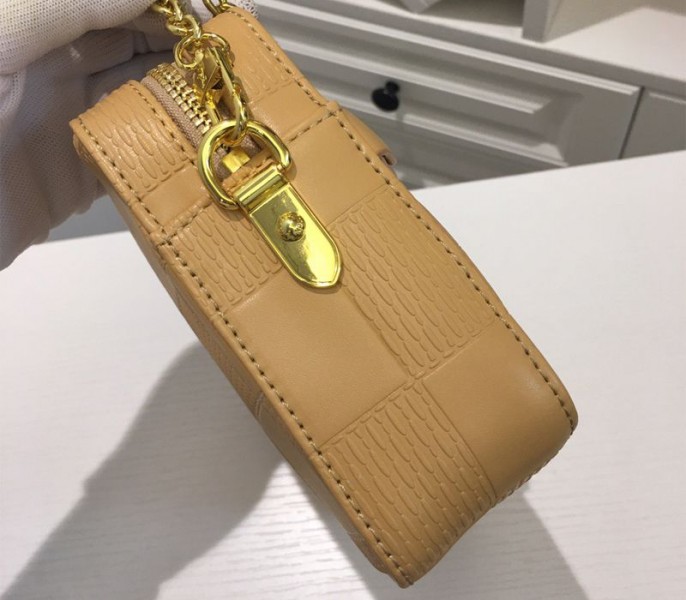 Louis Vuitton Troca PM Bag In Beige