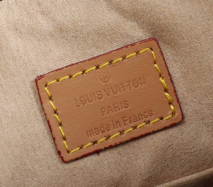 Louis Vuitton Monogram Canvas Odeon MM Bag In Natural