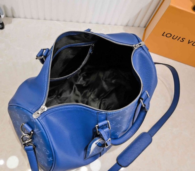 Louis Vuitton Taiga Leather Keepall Bandouliere 50 Travel Bag In Navy Blue