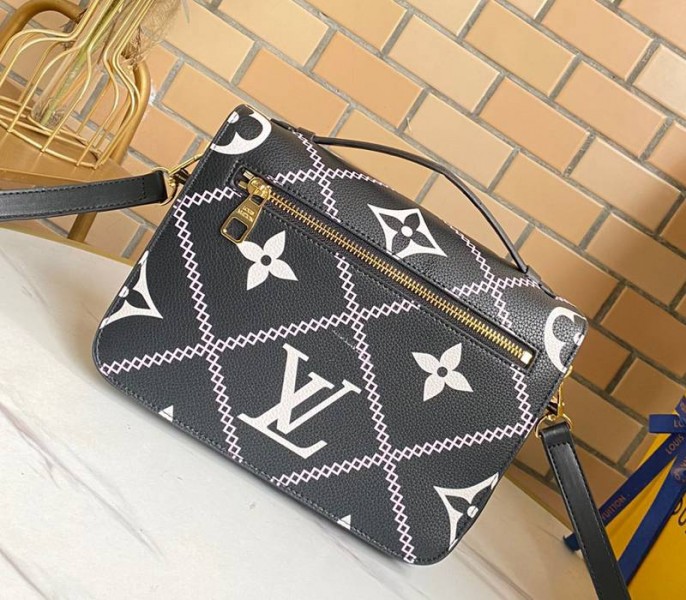 Louis Vuitton Spring 2022 Monogram Empreinte Pochette Metis Handbag In Black
