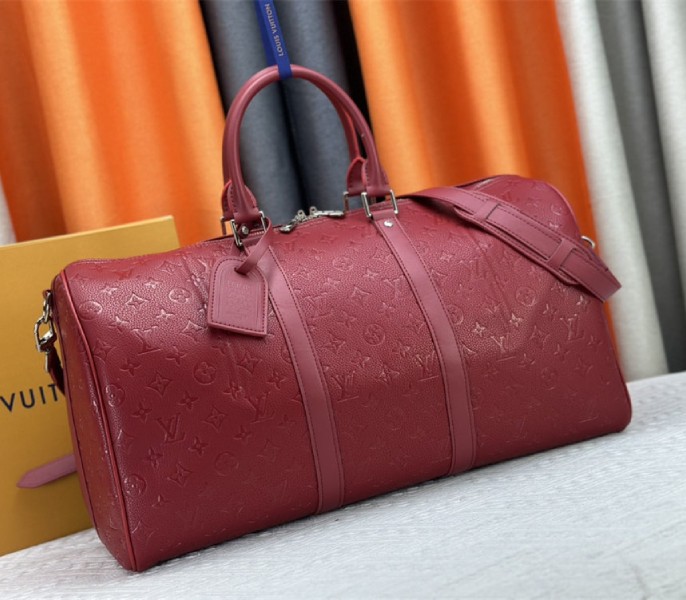 Louis Vuitton Taurillon Leather Keepall Bandouliere 50 In Sari Red