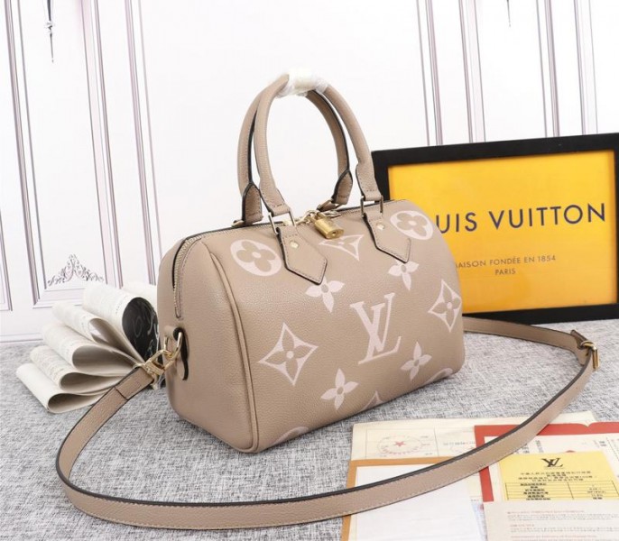 Louis Vuitton Bicolor Monogram Empreinte Leather Speedy Bandouliere 25 Handbag In Tourterelle Gray And Cream