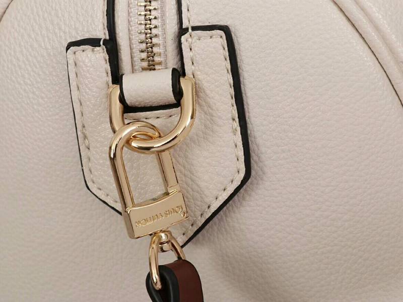 Louis Vuitton Monogram Empreinte Speedy Bandouliere 25 Handbag In Cream