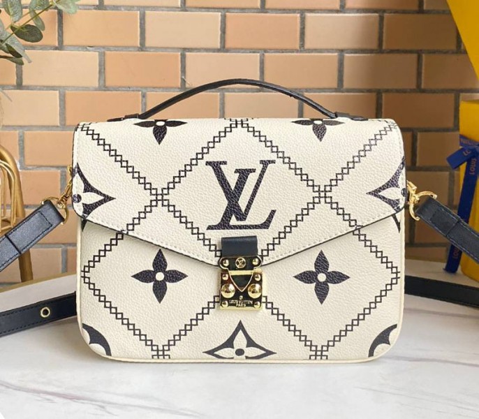Louis Vuitton Spring 2022 Monogram Empreinte Pochette Metis Handbag In Cream