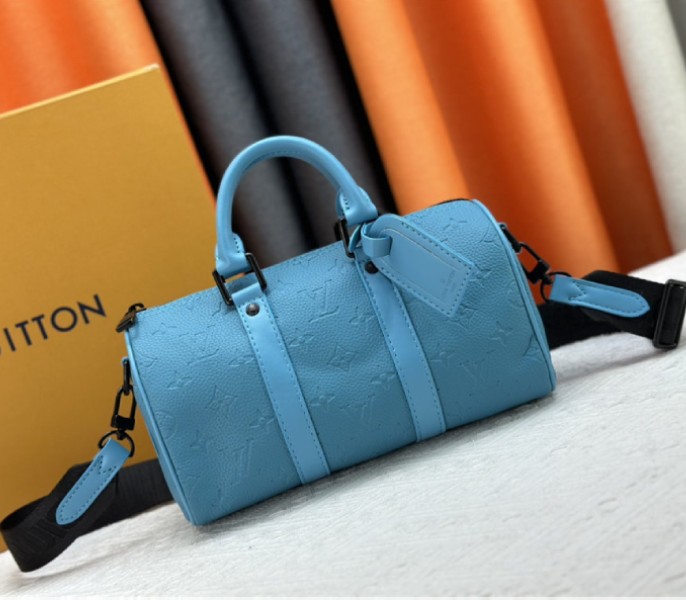 Louis Vuitton Taurillon Monogram Leather Keepall Bandouliere 25 In Turquoise