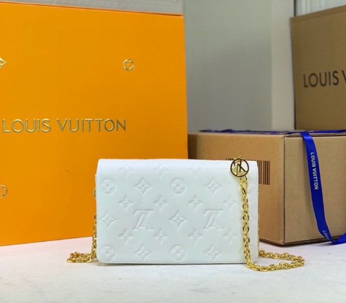 Louis Vuitton Coussin Pochette In Cream