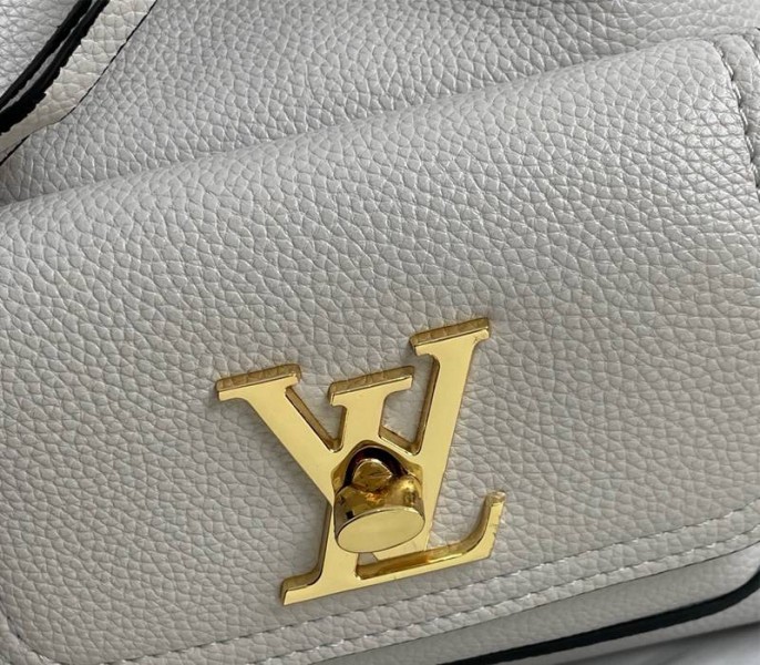 Louis Vuitton Lockme Bucket Bag In Greige