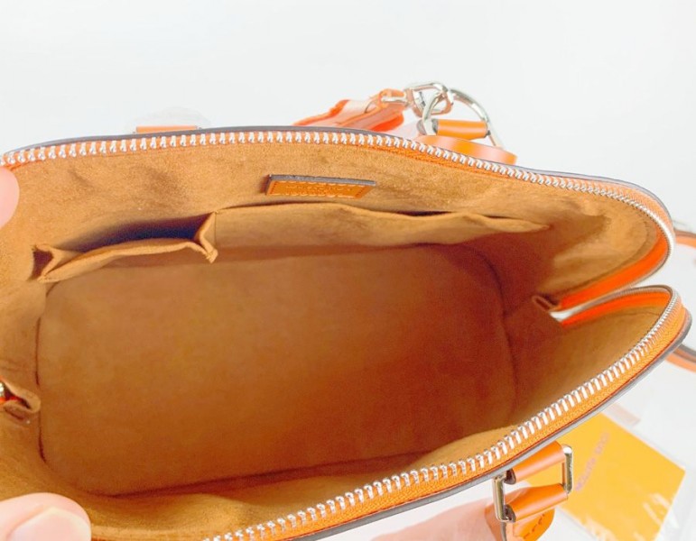 Louis Vuitton Epi Leather Alma PM Handbag In Orange With Jacquard Strap