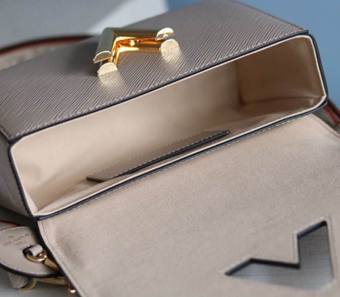 Louis Vuitton Epi Leather Twist MM Handbag In Galet Gray With Embroidered Strap