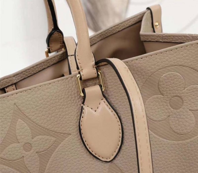 Louis Vuitton Monogram Empreinte Giant Onthego GM Tote In Beige