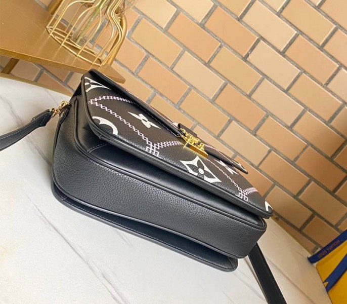 Louis Vuitton Spring 2022 Monogram Empreinte Pochette Metis Handbag In Black