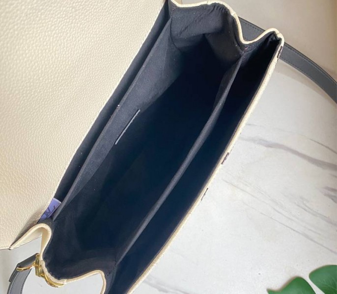 Louis Vuitton Spring 2022 Monogram Empreinte Pochette Metis Handbag In Cream