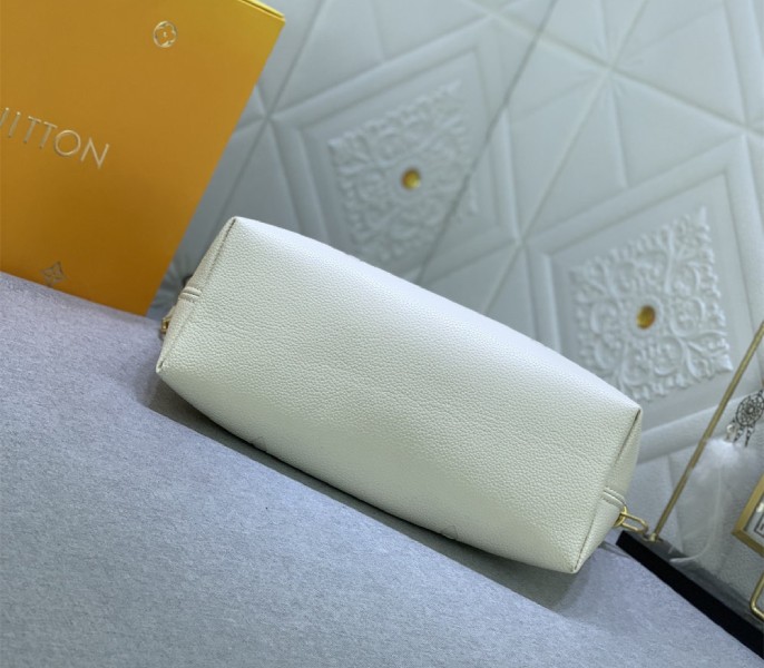 Louis Vuitton Monogram Empreinte Leather Bundle Bag In Cream