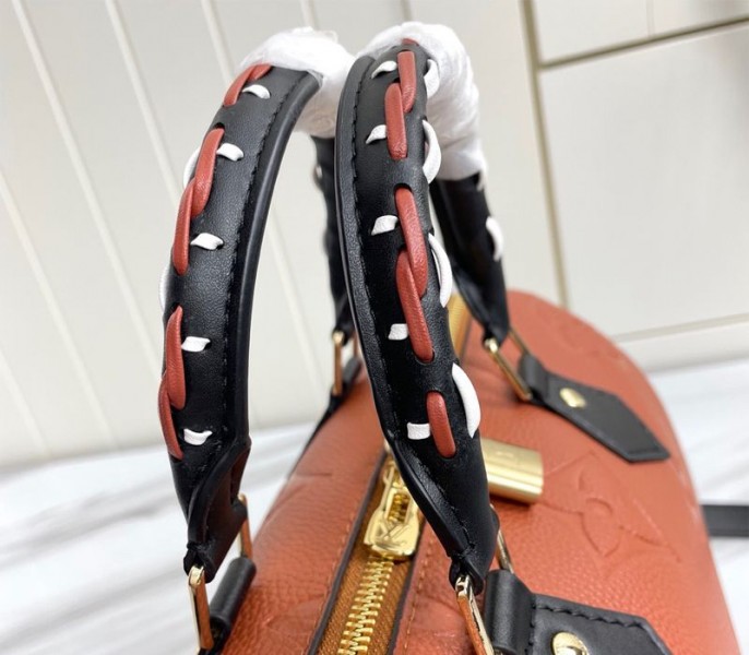 Louis Vuitton Monogram Empreinte Wild At Heart Speedy 25 Bandouliere Handbag In Caramel Brown