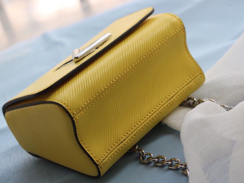 Louis Vuitton Epi Leather Twist Mini Bag In Yellow