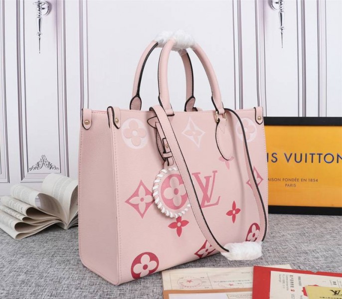 Louis Vuitton Monogram Empreinte Leather Onthego MM Bag In Pink