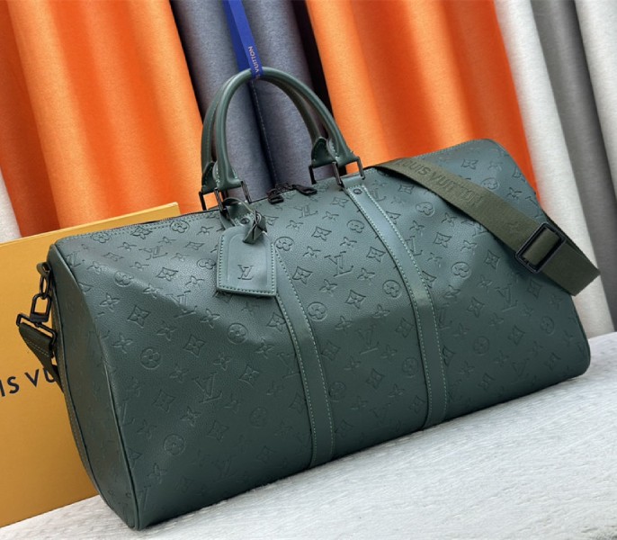 Louis Vuitton Taurillon Leather Keepall Bandouliere 50 In Borneo Green