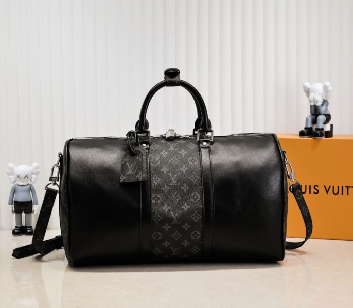 Louis Vuitton Taiga Leather Keepall Bandouliere 50 Travel Bag In Black