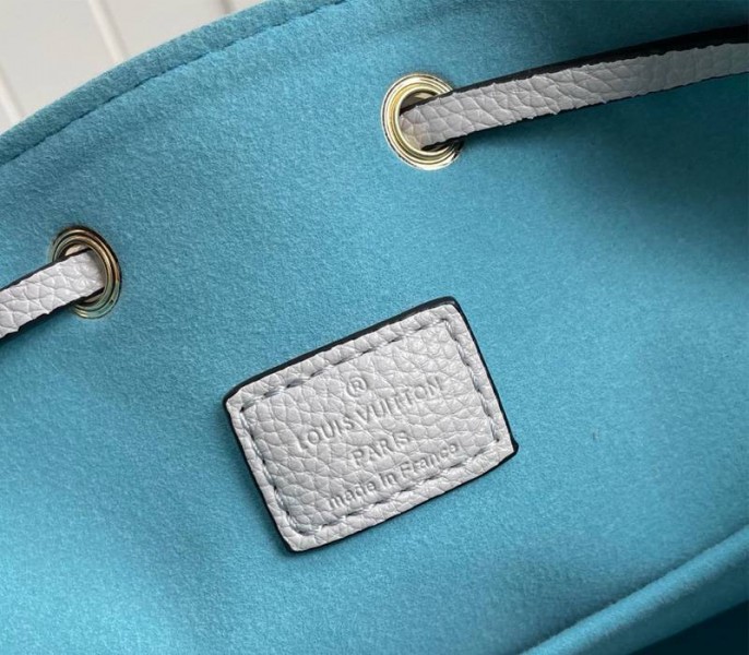 Louis Vuitton Lockme Bucket Bag In Greige