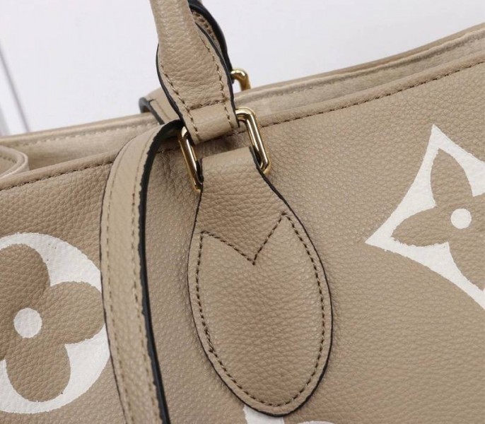 Louis Vuitton Monogram Empreinte OnTheGo MM Tote In Tourterelle Gray